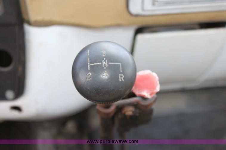 image for item D7697 1979 GMC 6000 flatbed dump truck