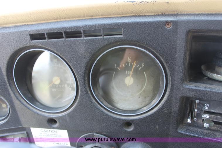 image for item D7697 1979 GMC 6000 flatbed dump truck