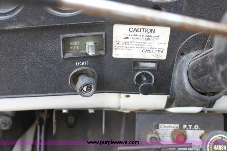 image for item D7697 1979 GMC 6000 flatbed dump truck