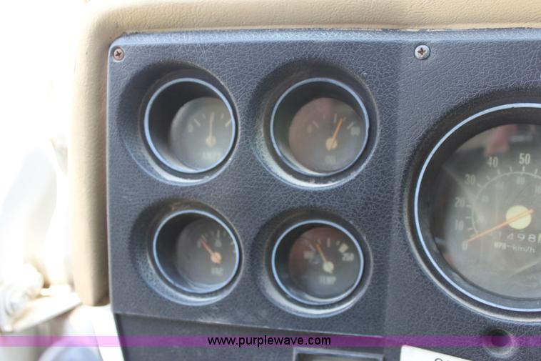 image for item D7697 1979 GMC 6000 flatbed dump truck