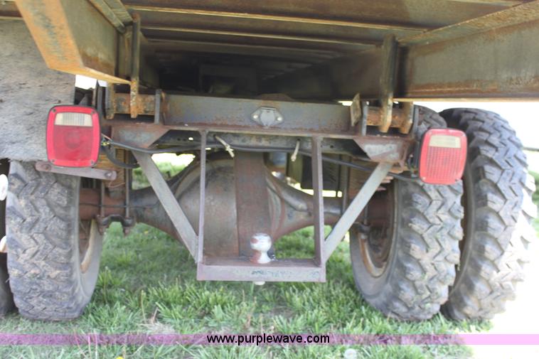 image for item D7697 1979 GMC 6000 flatbed dump truck