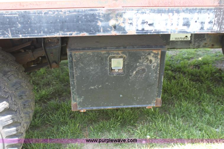 image for item D7697 1979 GMC 6000 flatbed dump truck