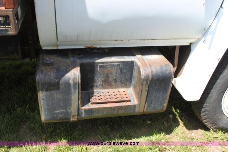 image for item D7697 1979 GMC 6000 flatbed dump truck