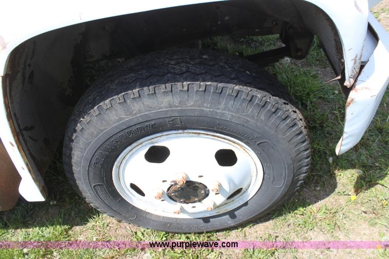 image for item D7697 1979 GMC 6000 flatbed dump truck