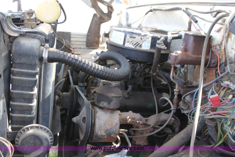 image for item D7697 1979 GMC 6000 flatbed dump truck