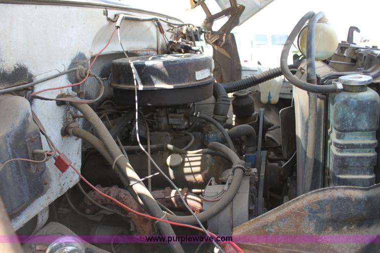 image for item D7697 1979 GMC 6000 flatbed dump truck