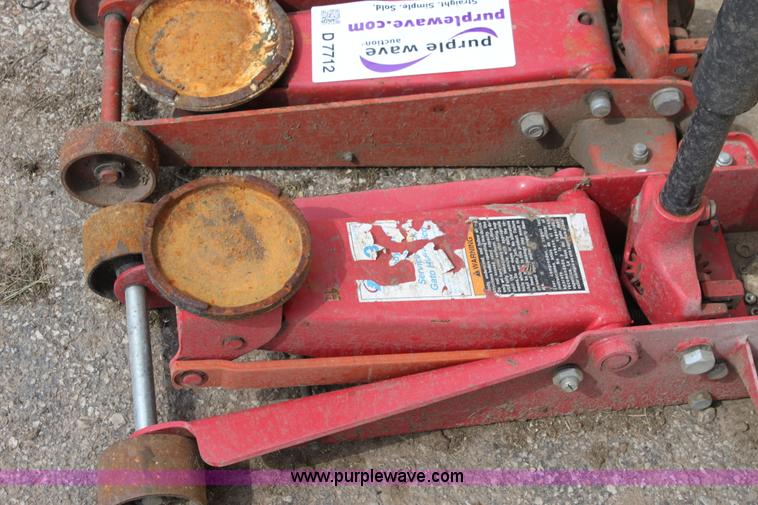 image for item D7712 (3) 2 ton floor jacks