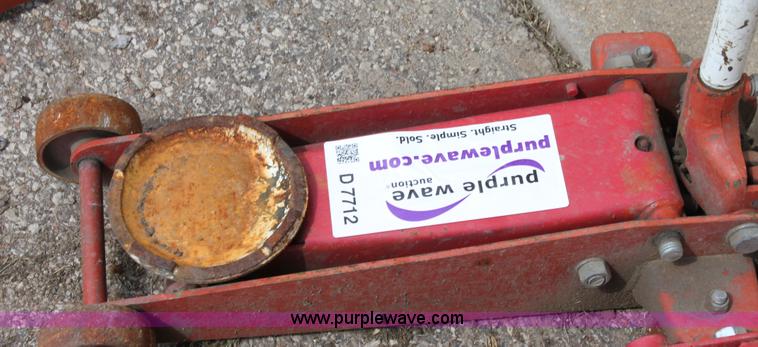 image for item D7712 (3) 2 ton floor jacks