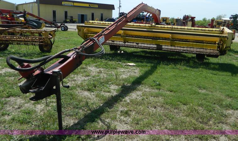 image for item B3657 New Holland 1475 hydro swing swather