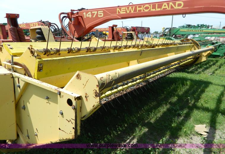 image for item B3657 New Holland 1475 hydro swing swather