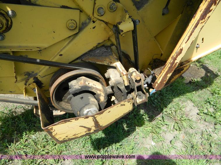 image for item B3657 New Holland 1475 hydro swing swather