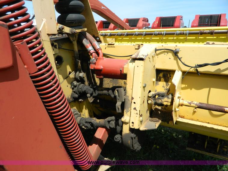 image for item B3657 New Holland 1475 hydro swing swather