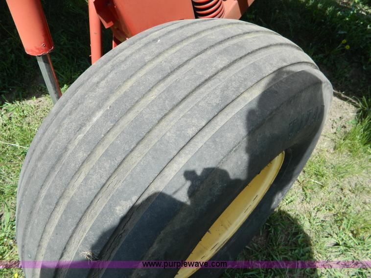 image for item B3657 New Holland 1475 hydro swing swather