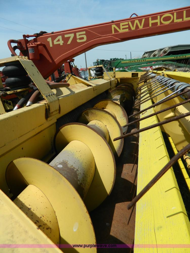 image for item B3657 New Holland 1475 hydro swing swather