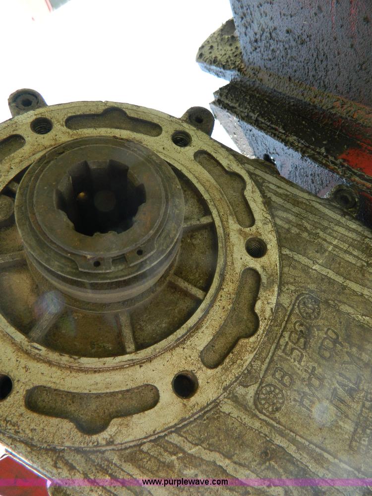 image for item B3657 New Holland 1475 hydro swing swather