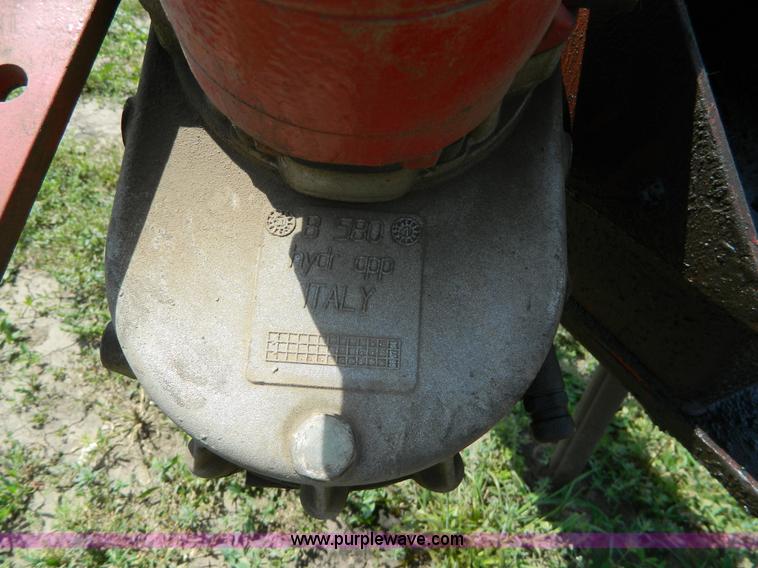 image for item B3657 New Holland 1475 hydro swing swather