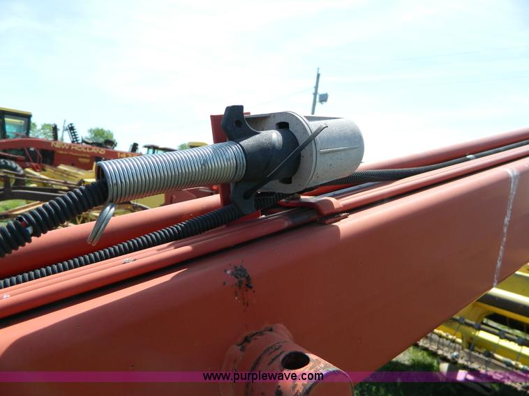 image for item B3657 New Holland 1475 hydro swing swather