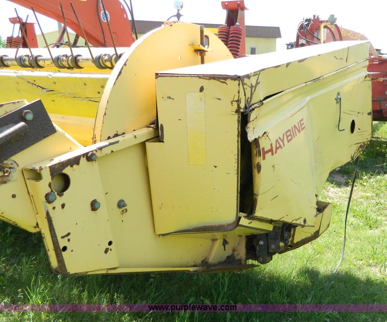 image for item B3657 New Holland 1475 hydro swing swather