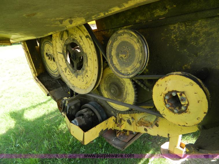 image for item B3657 New Holland 1475 hydro swing swather