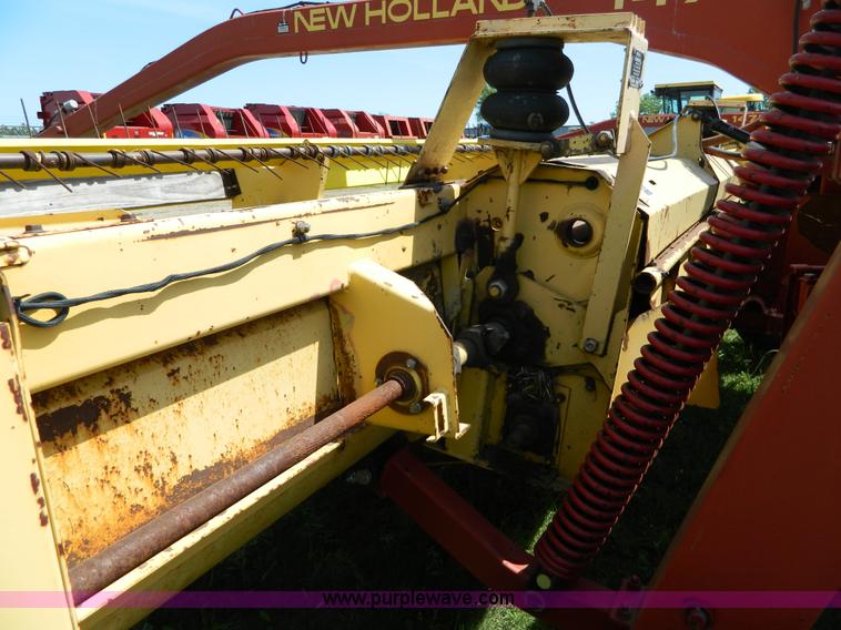 image for item B3657 New Holland 1475 hydro swing swather