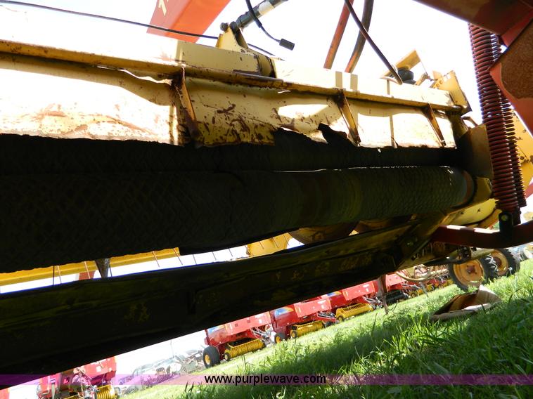image for item B3657 New Holland 1475 hydro swing swather