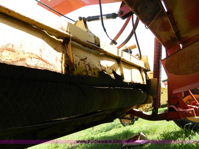 image for item B3657 New Holland 1475 hydro swing swather