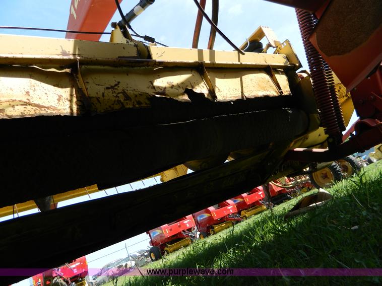 image for item B3657 New Holland 1475 hydro swing swather