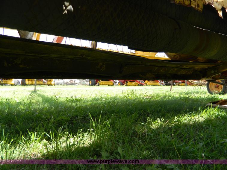 image for item B3657 New Holland 1475 hydro swing swather