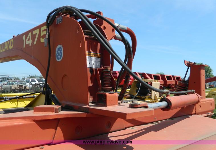 image for item B3657 New Holland 1475 hydro swing swather