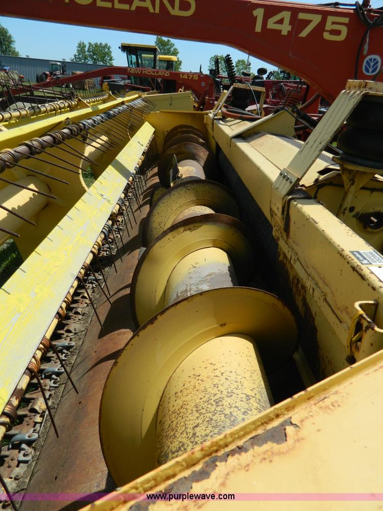 image for item B3657 New Holland 1475 hydro swing swather