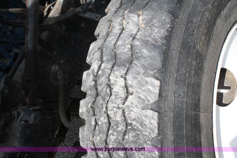 image for item B6545 1993 International 4900 semi truck with mixer box