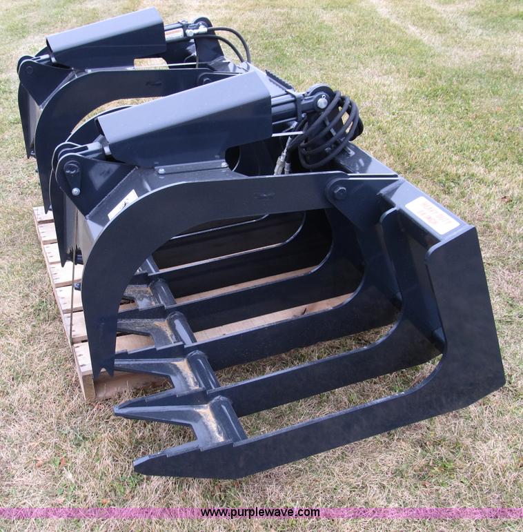 image for item I9773 Stout XHD84 hydraulic brush grapple skid steer attachment