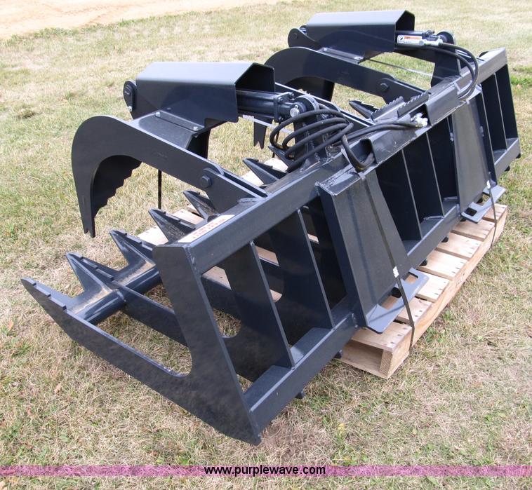 image for item I9773 Stout XHD84 hydraulic brush grapple skid steer attachment
