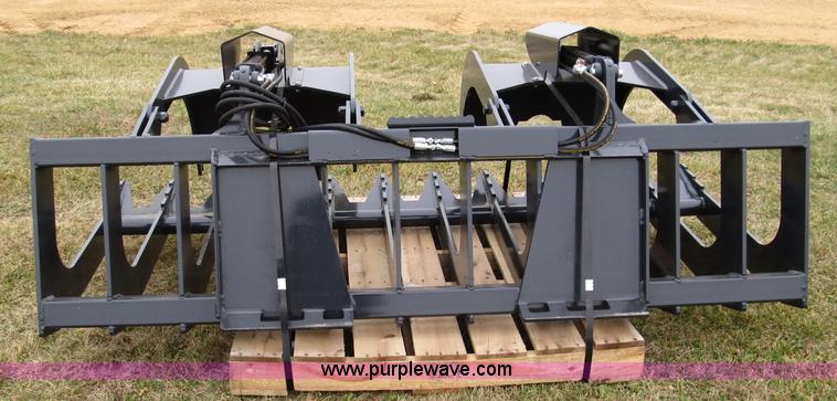 image for item I9773 Stout XHD84 hydraulic brush grapple skid steer attachment