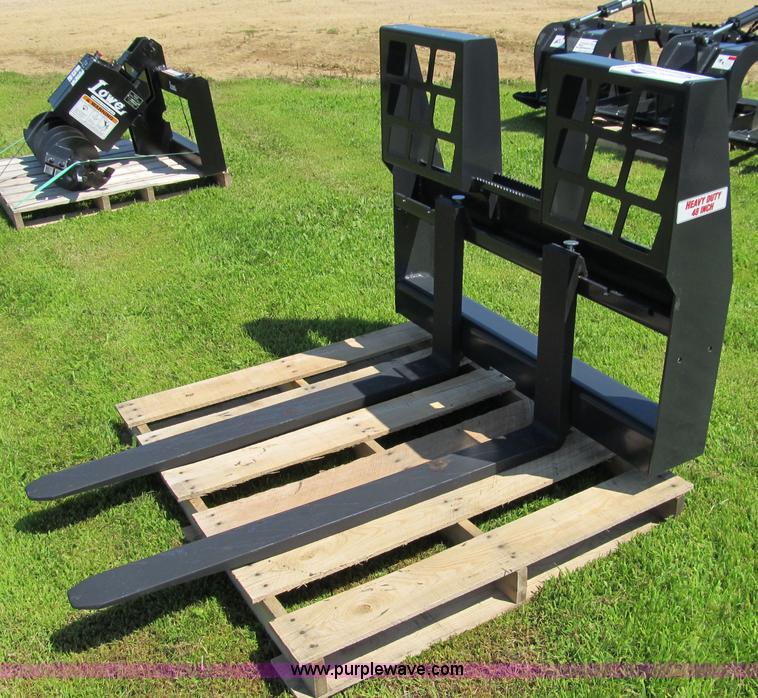 image for item I9776 Stout walk-through pallet fork skid steer attachment