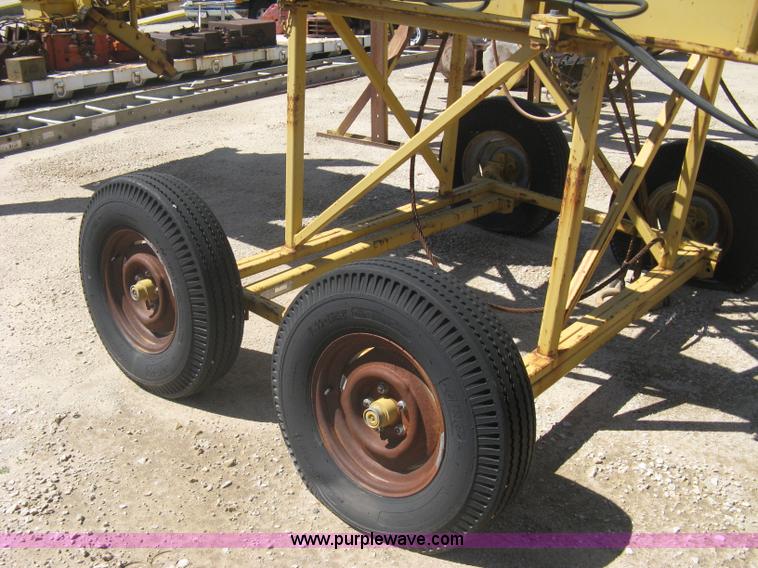 image for item A6242 Gomaco 32' bridge deck water and cure applicator with tandem transport dolly