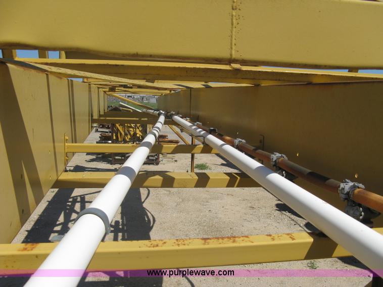 image for item A6242 Gomaco 32' bridge deck water and cure applicator with tandem transport dolly