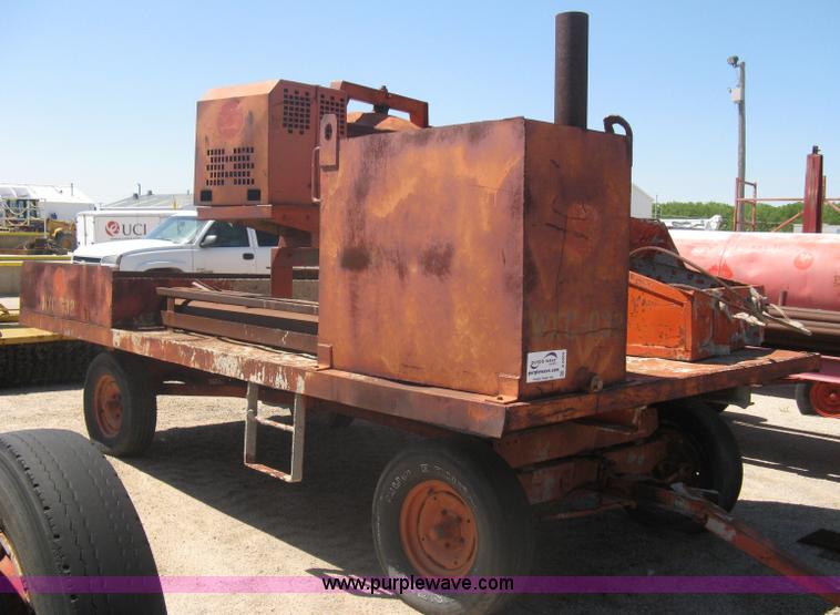image for item A6264 Wagon running gear with mounted cement work tools