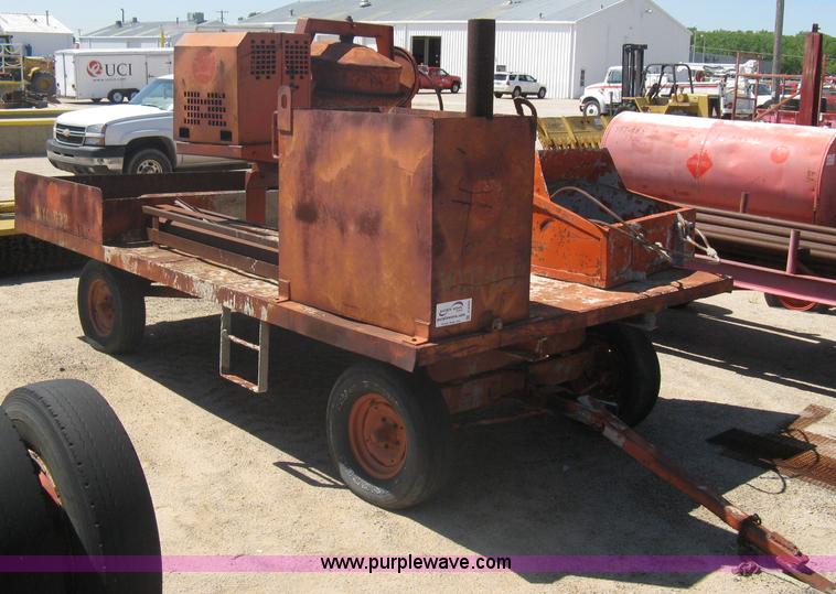 image for item A6264 Wagon running gear with mounted cement work tools