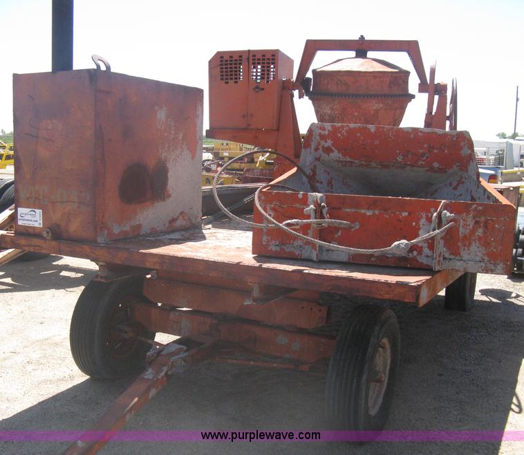 image for item A6264 Wagon running gear with mounted cement work tools