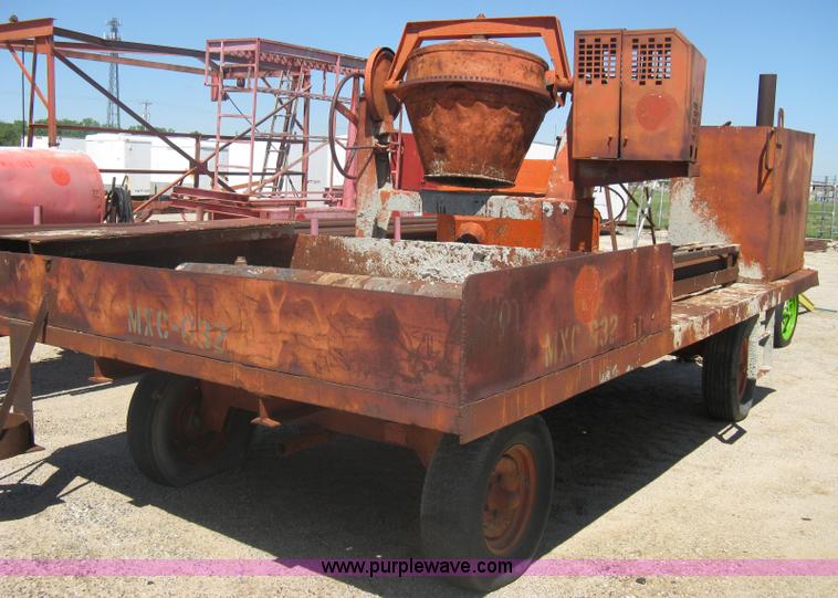 image for item A6264 Wagon running gear with mounted cement work tools