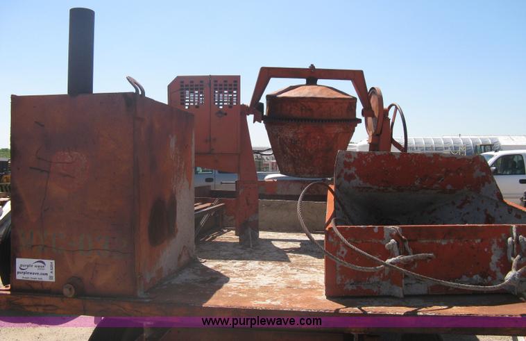 image for item A6264 Wagon running gear with mounted cement work tools