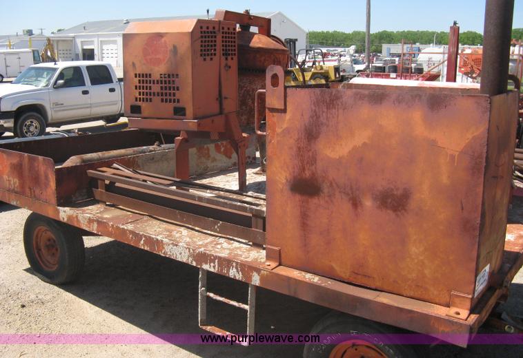 image for item A6264 Wagon running gear with mounted cement work tools