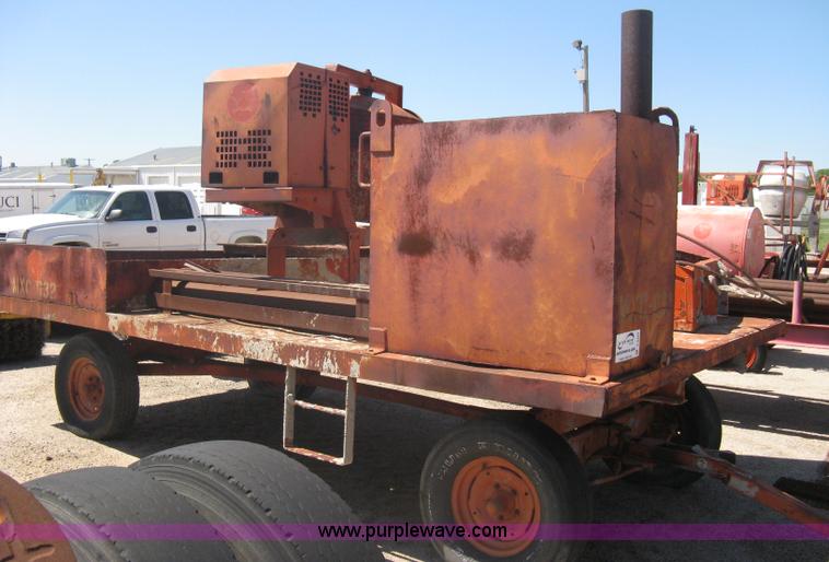 image for item A6264 Wagon running gear with mounted cement work tools