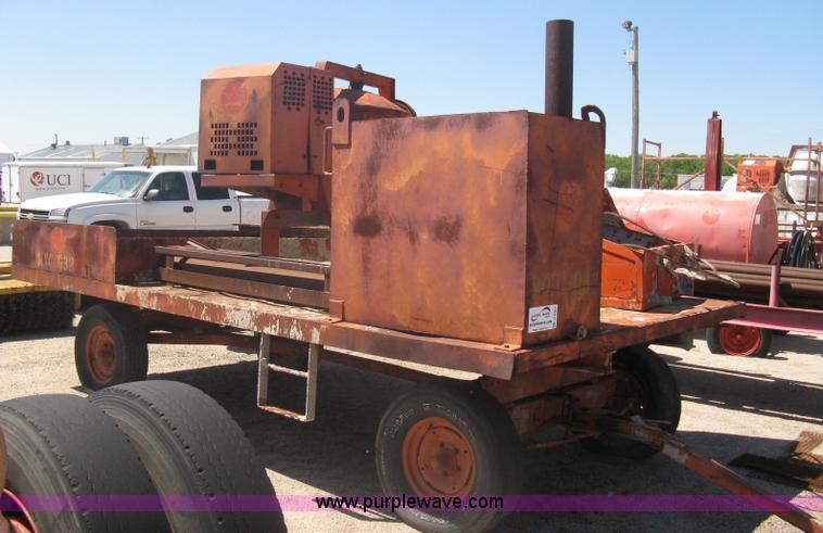 image for item A6264 Wagon running gear with mounted cement work tools