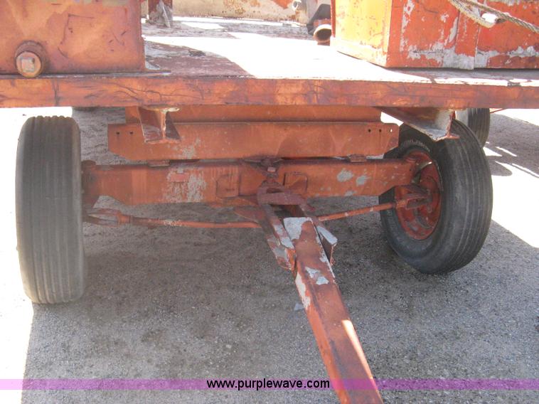 image for item A6264 Wagon running gear with mounted cement work tools