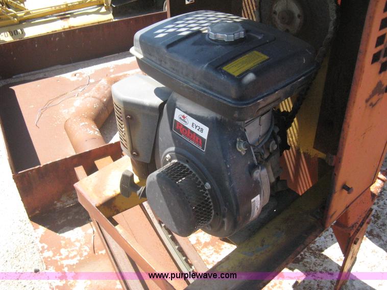 image for item A6264 Wagon running gear with mounted cement work tools