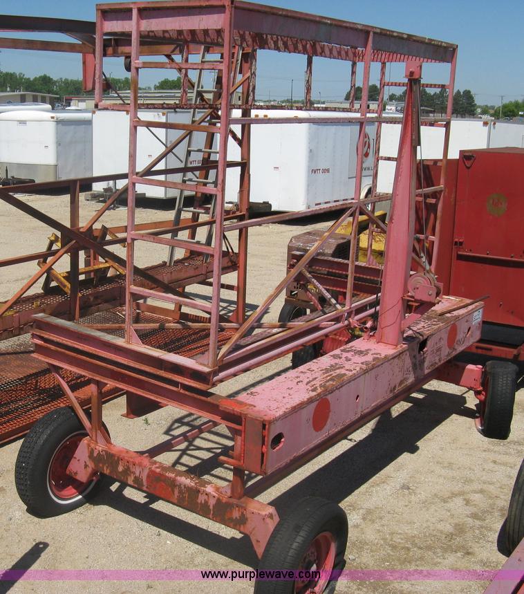 image for item A6266 Wagon running gear with manual lift and tilt working man basket