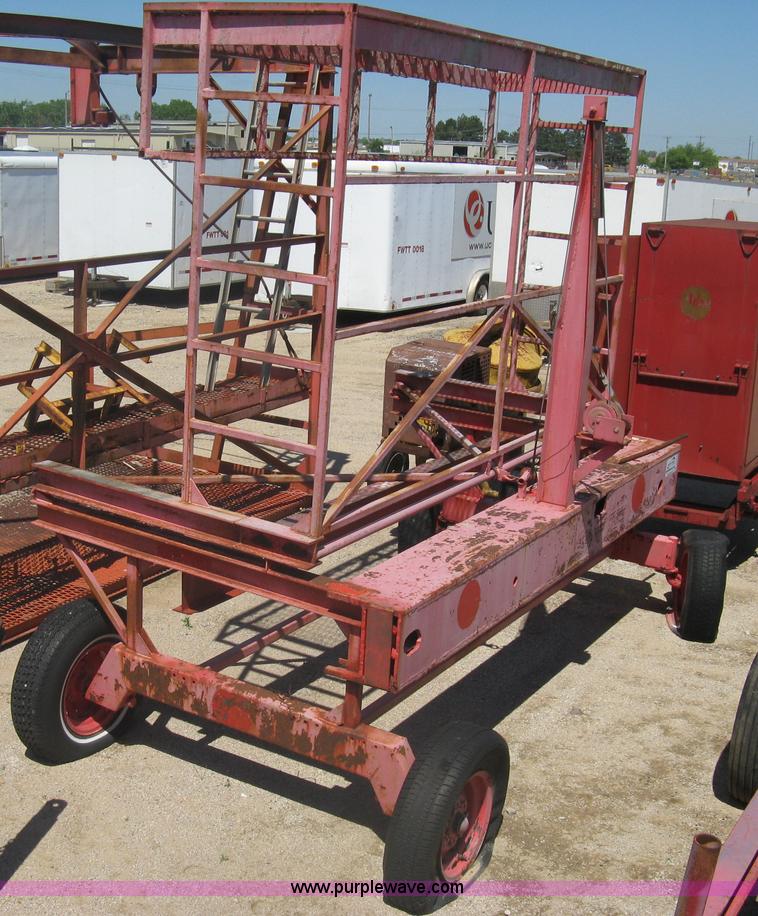 image for item A6266 Wagon running gear with manual lift and tilt working man basket
