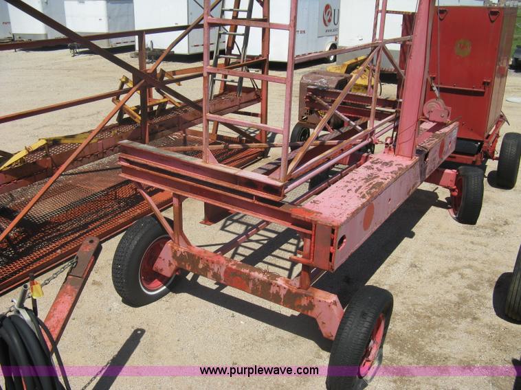 image for item A6266 Wagon running gear with manual lift and tilt working man basket